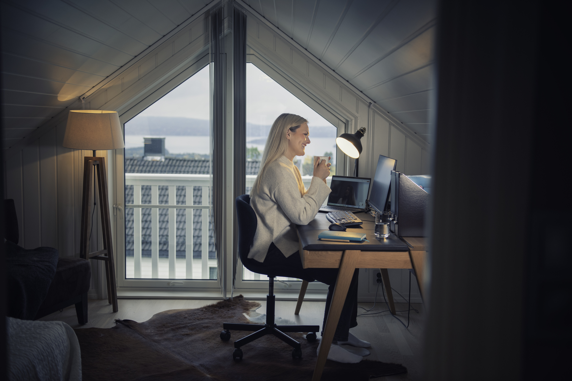 Woman sitting in front of computer
