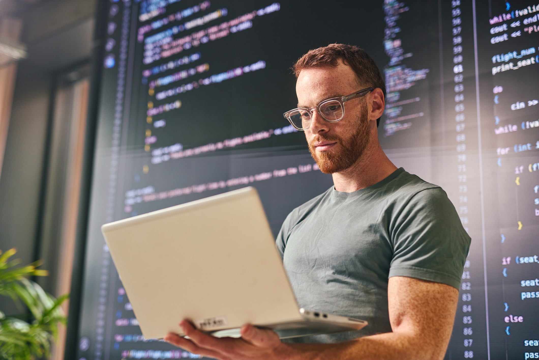 A man who programs on a computer