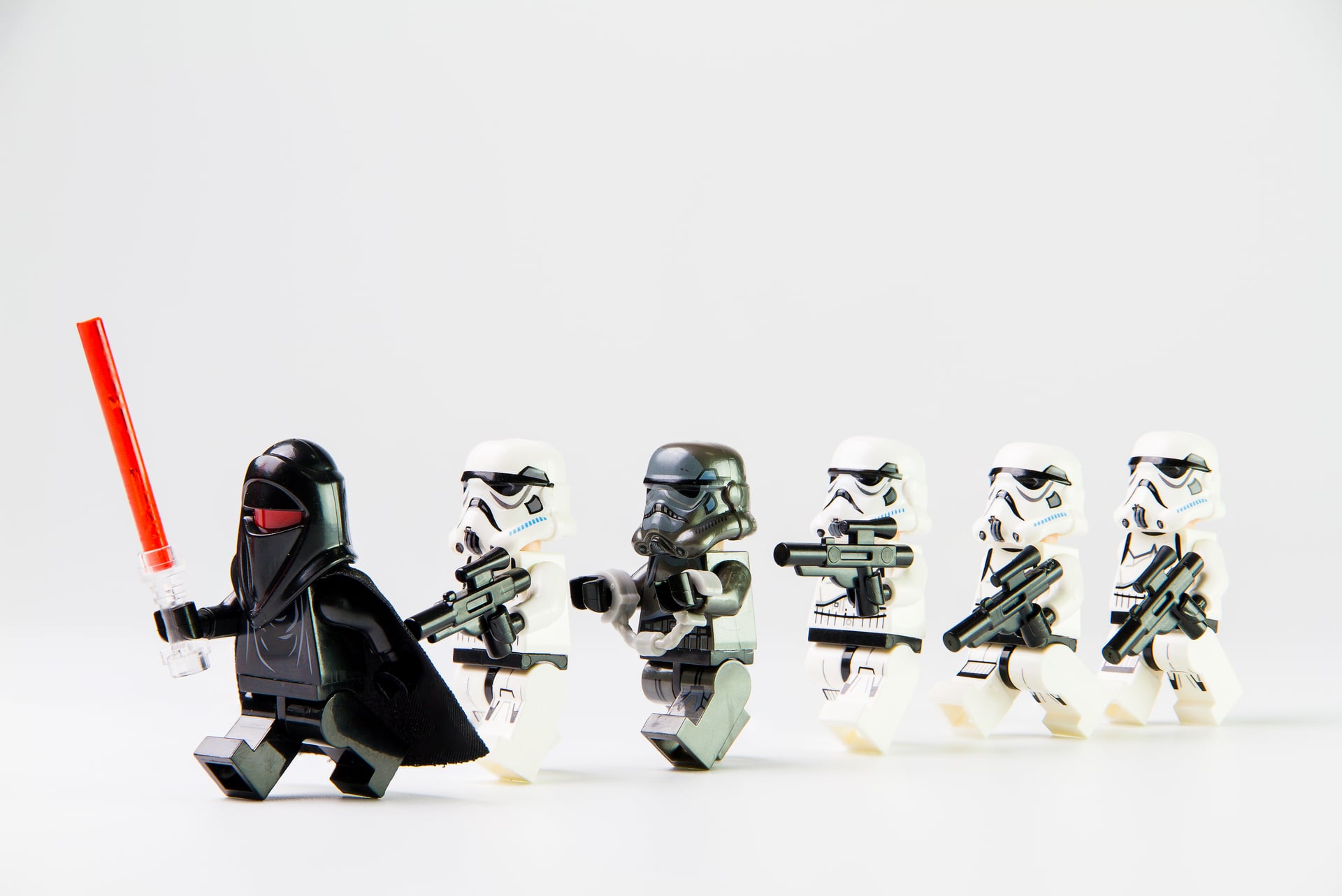 Lego figures, stormtroopers and Darth Vader lead the march. Gettyimagges.