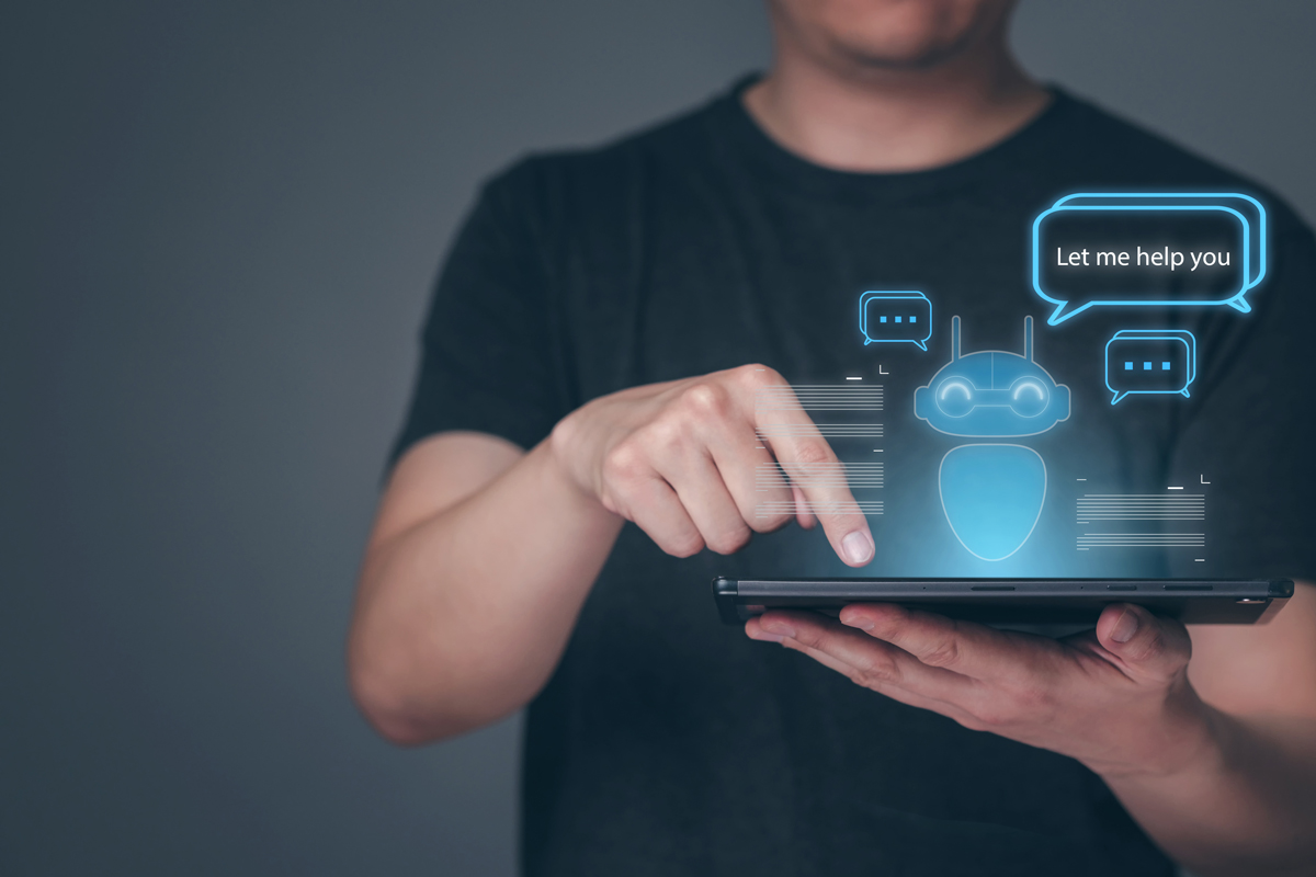 Illustrative photo of man using AI to apply for a job