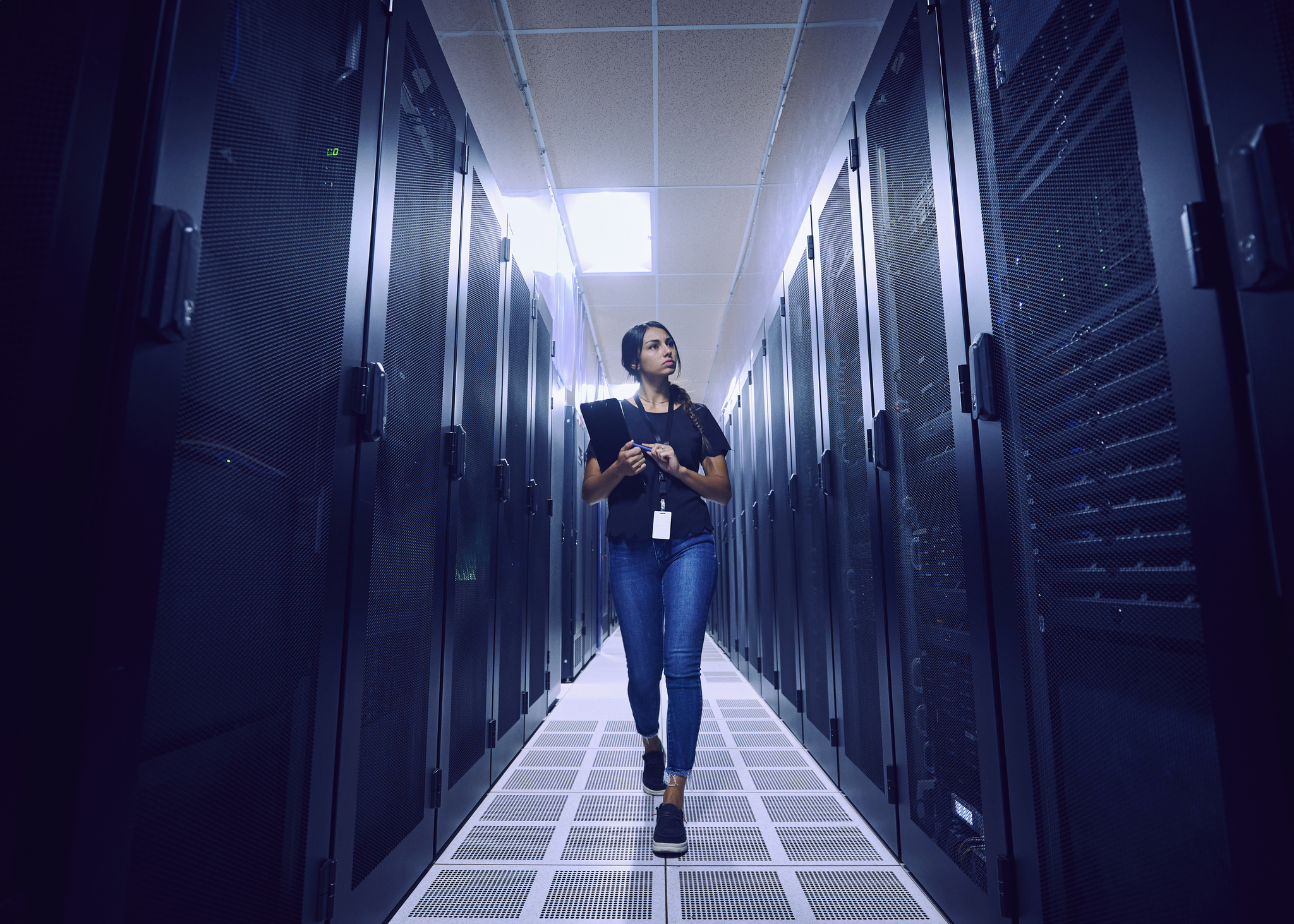 Woman in server room.