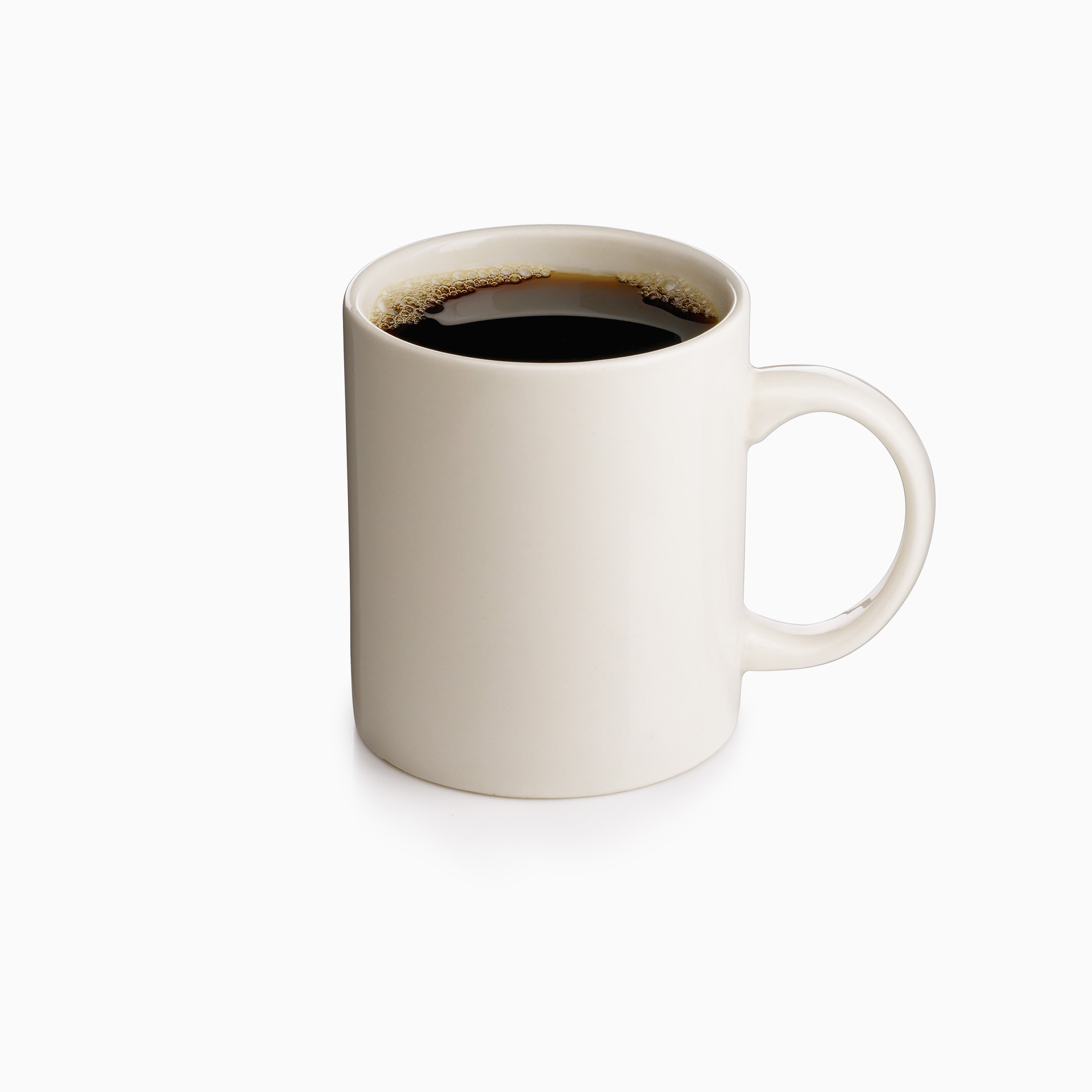 Simple white ceramic cup filled with black coffee, against a white background. Minimalist and timeless. Illustration photo