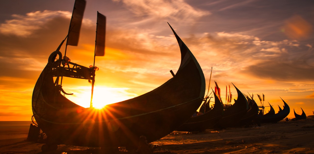 Viking boat at sunset photo:GettyImages