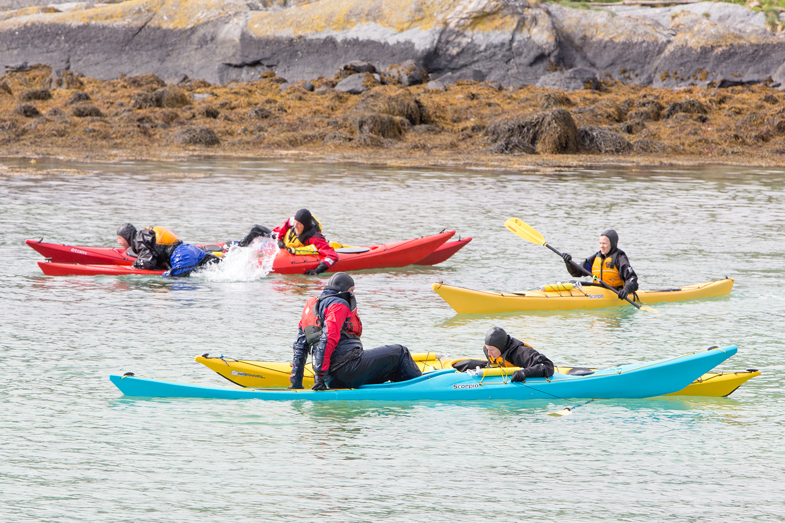 More people in kayaks on the water