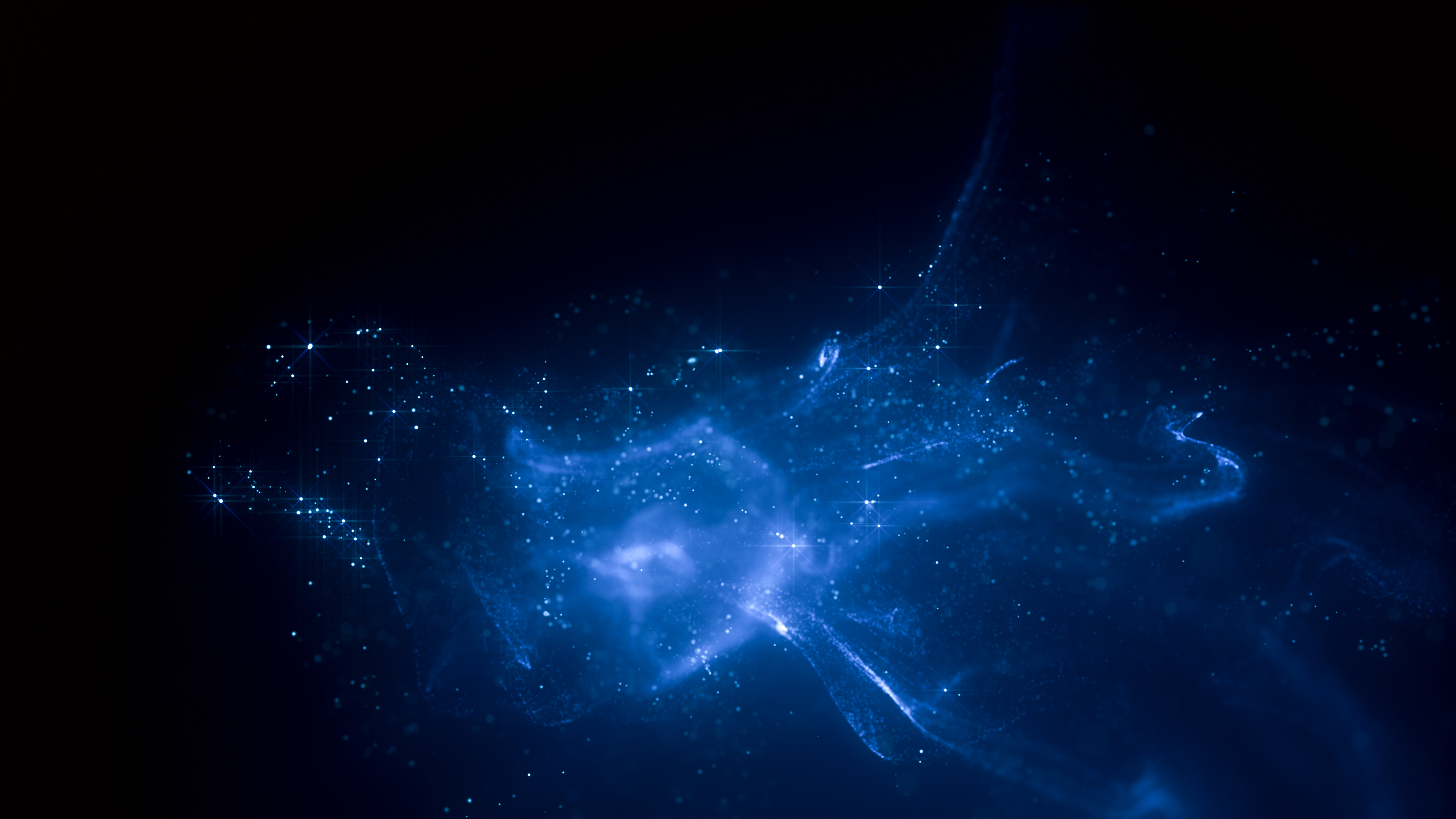 Abstrakt bakgrunn av tusenvis av uskarpe partikler og gnister