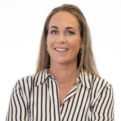 Smiling woman with long blonde hair and striped shirt